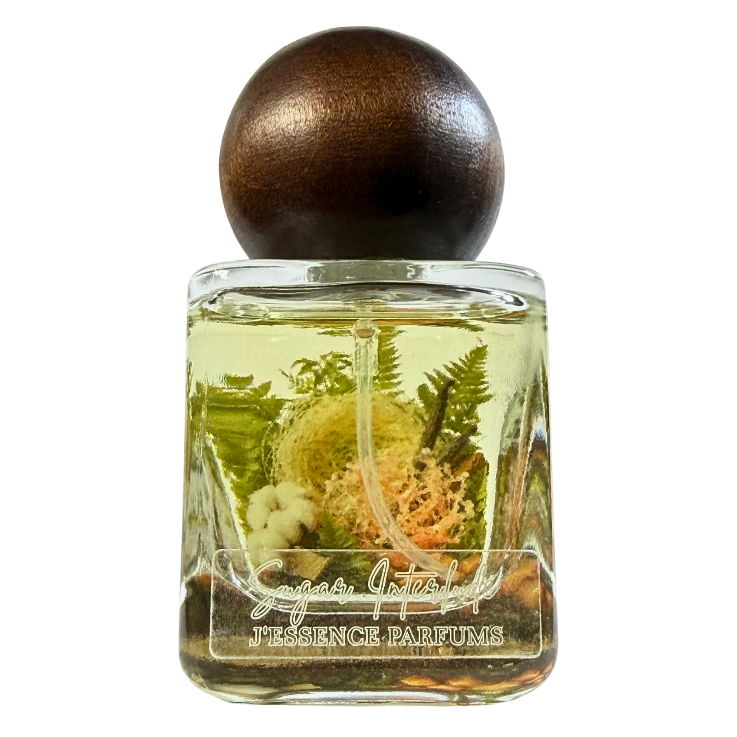 Artisanal 30ml Sugar Interlude perfume bottle with a spherical wooden cap and a botanical terrarium style label. J'essence Parfums niche gourmand fragrance hand poured in NZ.